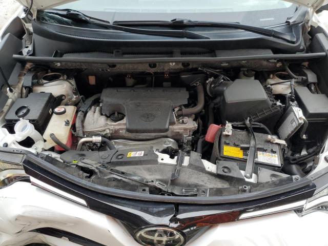 Photo 11 from auction – 2018 TOYOTA RAV4 LE with VIN JTMBFREV5JD246200