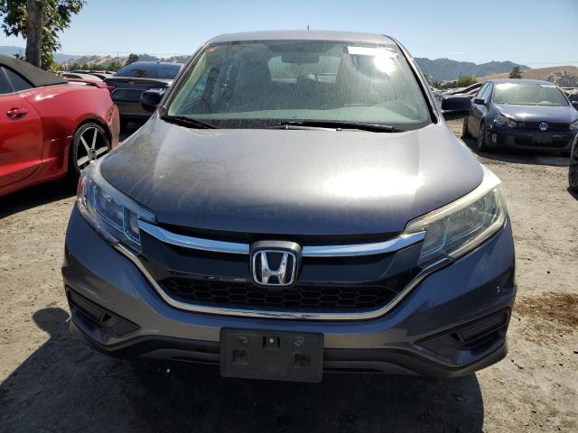 Photo 5 from auction – 2015 HONDA CR-V LX with VIN 3CZRM3H39FG704787