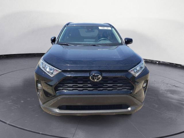 Photo 5 from auction – 2020 TOYOTA RAV4 XLE with VIN JTMP1RFV0LD051109