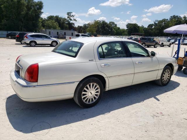 Photo 3 from auction – 2004 LINCOLN TOWN CAR E with VIN 1LNHM81WX4Y685264