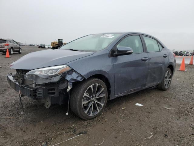 TOYOTA COROLLA L 2017 with VIN 5YFBURHE1HP608192 - Photo from auction