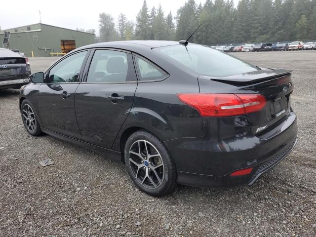 Photo 2 from auction – 2015 FORD FOCUS SE with VIN 1FADP3F20FL261911