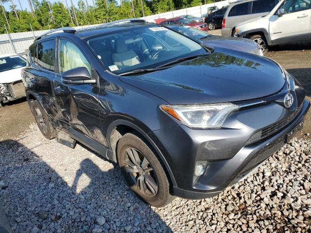Photo 4 from auction – 2016 TOYOTA RAV4 XLE with VIN JTMWFREV9GD089619