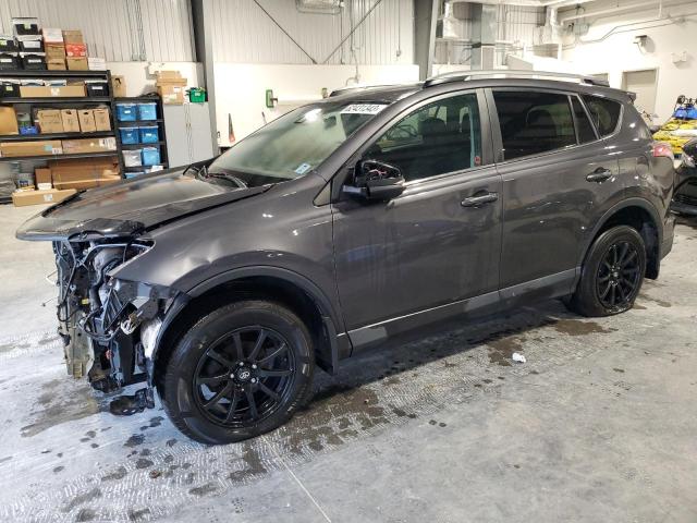 TOYOTA RAV4 LE 2018 with VIN 2T3BFREV2JW696681 - Photo from auction