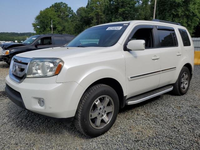 HONDA PILOT TOUR 2011 with VIN 5FNYF3H97BB036519 - Photo from auction