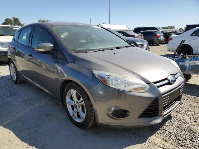 Foto 4 de la subasta – 2014 FORD FOCUS SE con VIN 1FADP3K22EL391645