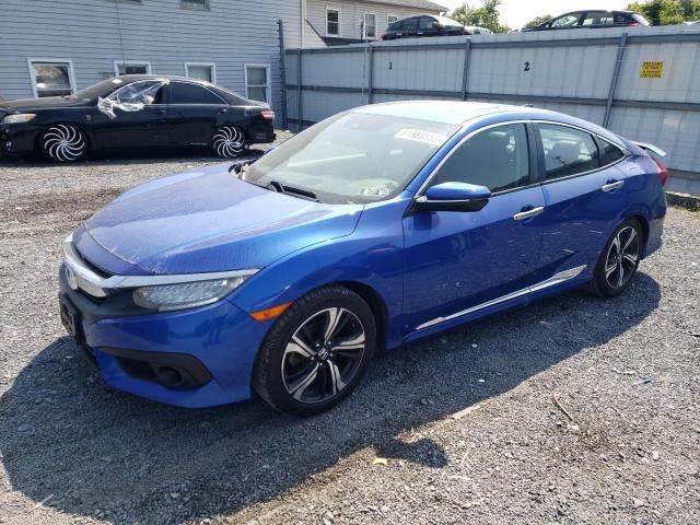 HONDA CIVIC TOUR 2016 with VIN 2HGFC1F98GH644138 - Photo from auction
