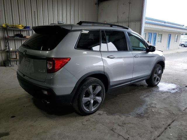 Photo 3 from auction – 2021 HONDA PASSPORT T with VIN 5FNYF8H99MB001030