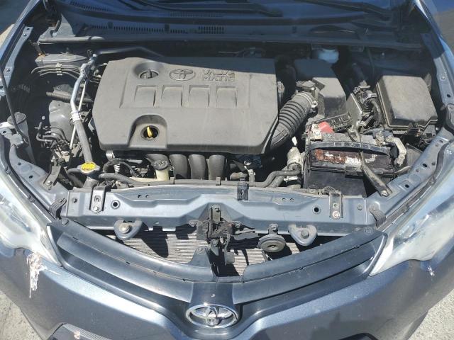 Photo 11 from auction – 2014 TOYOTA COROLLA EC with VIN 2T1BPRHE0EC214461