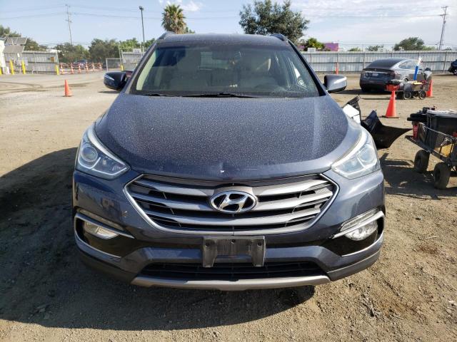 Photo 5 from auction – 2017 HYUNDAI SANTA FE S with VIN 5NMZU3LB6HH014684