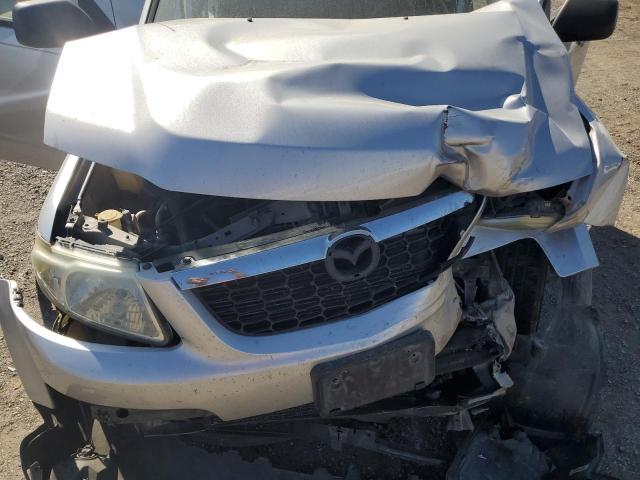 Photo 12 from auction – 2010 MAZDA TRIBUTE I with VIN 4F2CY9C75AKM09927
