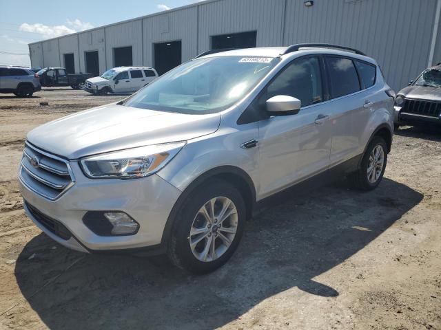 FORD ESCAPE SE 2018 with VIN 1FMCU9GD1JUA72975 - Photo from auction