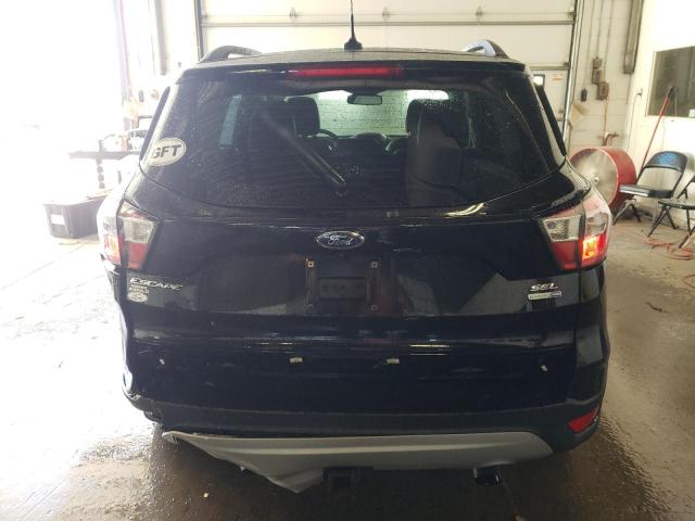 Photo 6 from auction – 2018 FORD ESCAPE SEL with VIN 1FMCU9HD7JUD37381