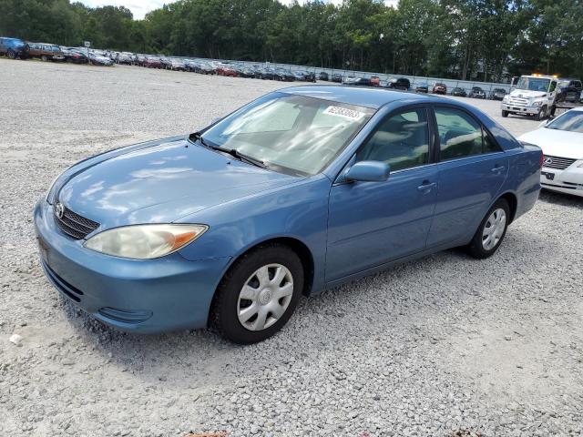 TOYOTA CAMRY LE 2004 with VIN 4T1BE32K64U891917 - Photo from auction