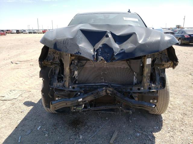 Photo 5 from auction – 2021 CHEVROLET SUBURBAN C with VIN 1GNSCFKD4MR435129