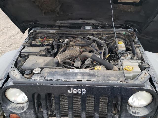 Photo 12 from auction – 2011 JEEP WRANGLER U with VIN 1J4HA6H15BL564707