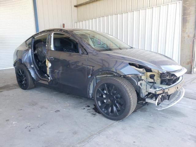 Photo 4 from auction – 2023 TESLA MODEL Y with VIN 7SAYGAEE3PF794516