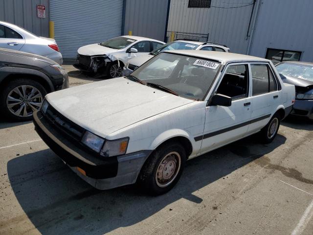 TOYOTA COROLLA 1987 with VIN JT2AE82E2H3492384 - Photo from auction