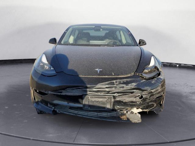 Photo 5 from auction – 2022 TESLA MODEL 3 with VIN 5YJ3E1EA3NF188852