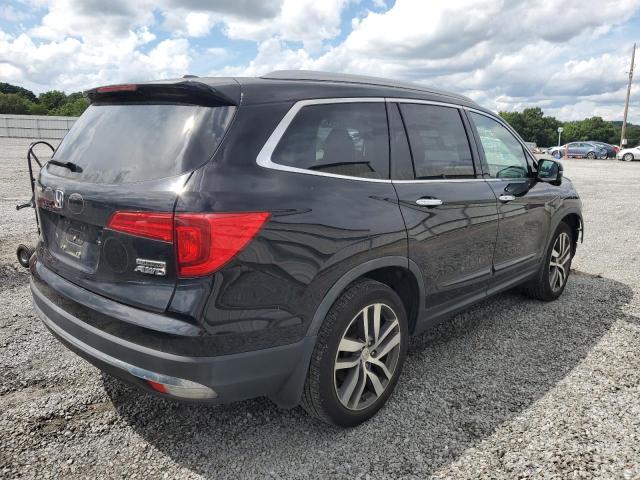 Photo 3 from auction – 2017 HONDA PILOT TOUR with VIN 5FNYF6H97HB040614