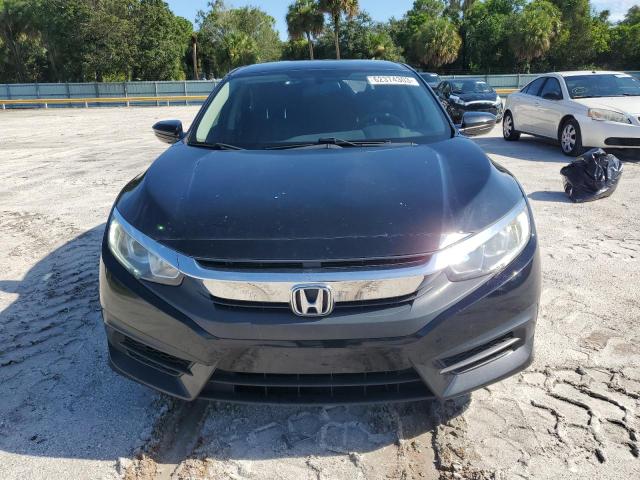 Photo 5 from auction – 2018 HONDA CIVIC LX with VIN 19XFC2F54JE009227