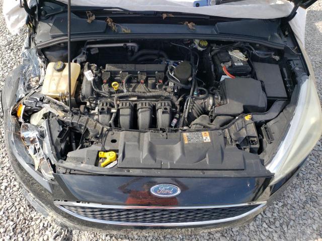 Photo 11 from auction – 2015 FORD FOCUS S with VIN 1FADP3E26FL209975