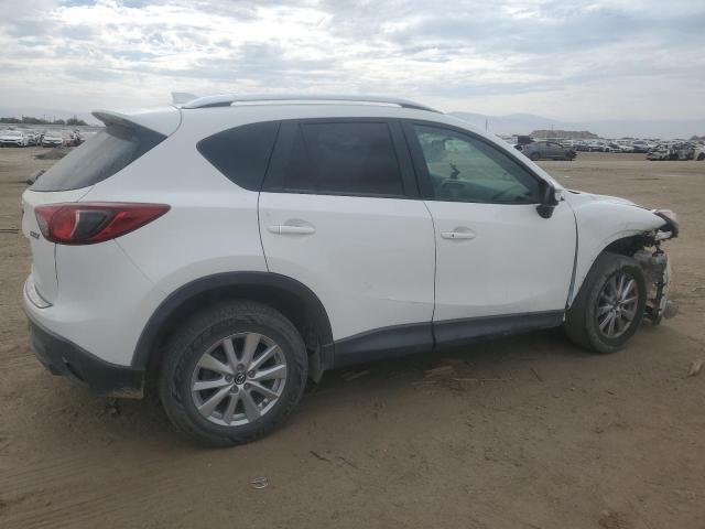 Photo 3 from auction – 2015 MAZDA CX-5 TOURI with VIN JM3KE4CY4F0468395