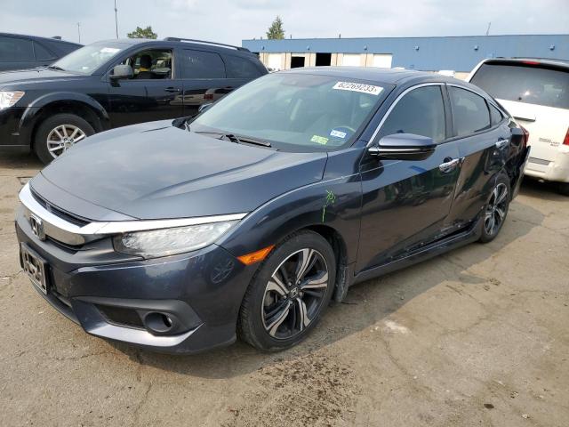 HONDA CIVIC TOUR 2017 with VIN 19XFC1F98HE005754 - Photo from auction