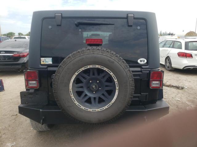 Photo 6 from auction – 2011 JEEP WRANGLER U with VIN 1J4HA5H14BL509353