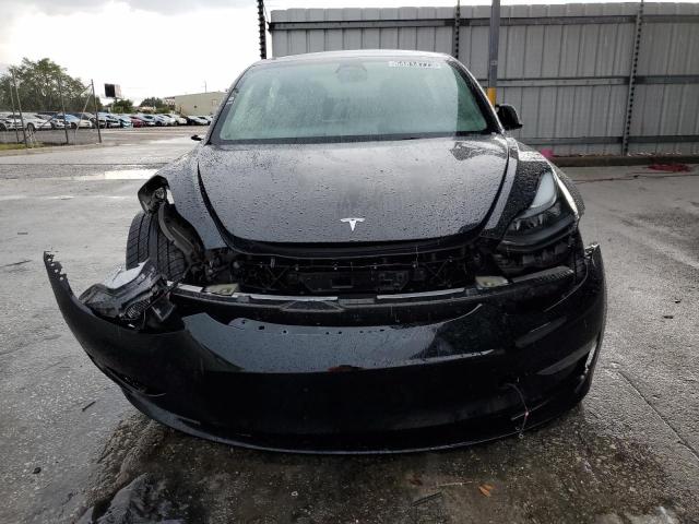 Photo 5 from auction – 2022 TESLA MODEL 3 with VIN 5YJ3E1EB0NF187442