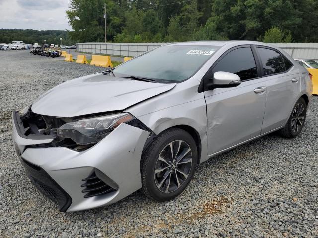 TOYOTA COROLLA L 2018 with VIN 5YFBURHE9JP758041 - Photo from auction