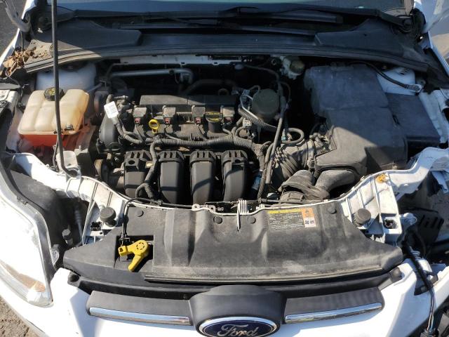 Photo 11 from auction – 2014 FORD FOCUS S with VIN 1FADP3E26EL174756