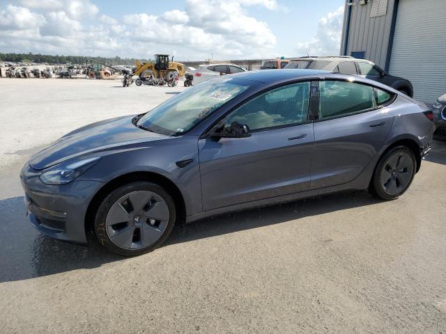 TESLA MODEL 3 2022 with VIN 5YJ3E1EB3NF285588 - Photo from auction