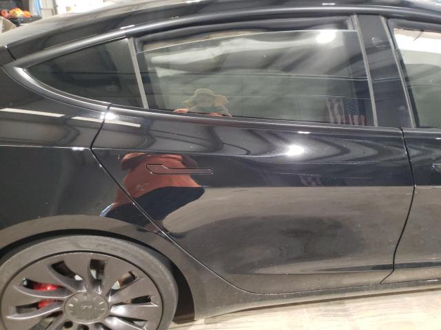 Photo 10 from auction – 2021 TESLA MODEL 3 with VIN 5YJ3E1EC1MF947899