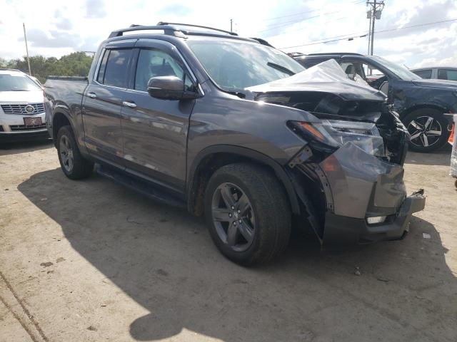 Photo 4 from auction – 2022 HONDA RIDGELINE with VIN 5FPYK3F74NB021873