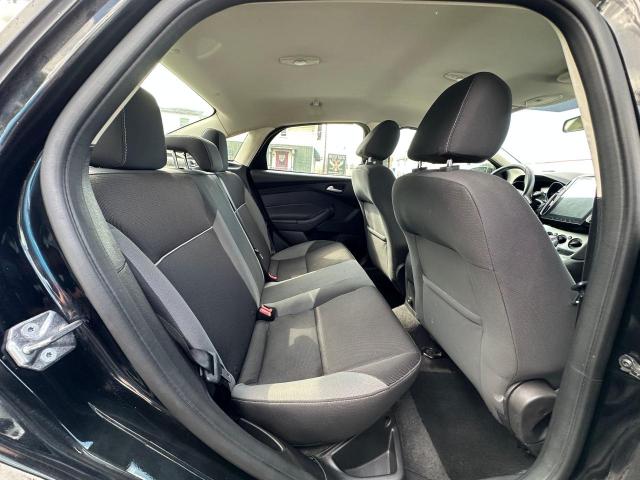 Photo 6 from auction – 2014 FORD FOCUS SE with VIN 1FADP3F25EL448401