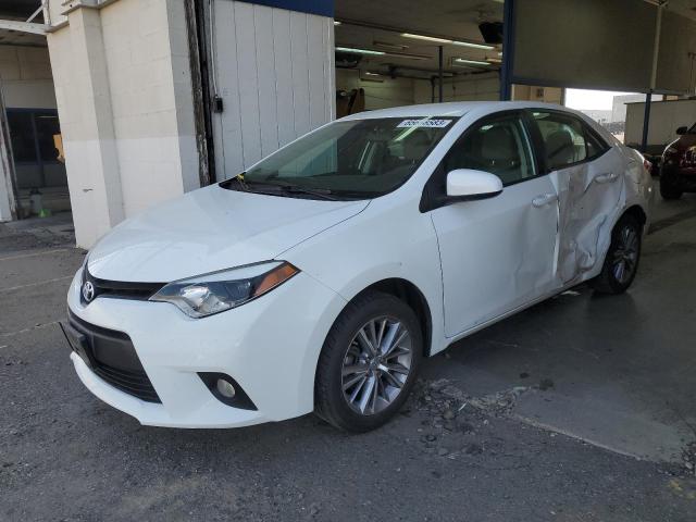 TOYOTA COROLLA L 2014 with VIN 5YFBURHE9EP177533 - Photo from auction
