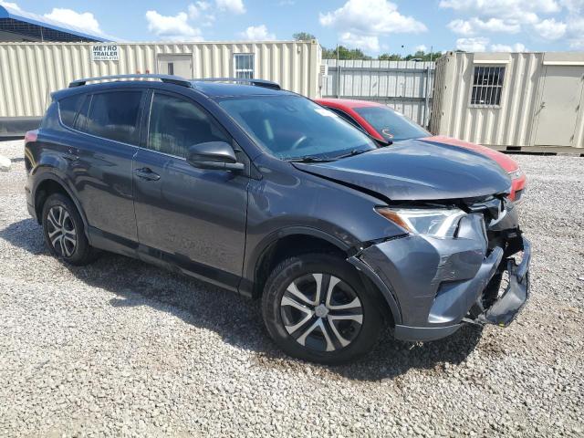 Photo 4 from auction – 2018 TOYOTA RAV4 LE with VIN JTMZFREV2JJ154381