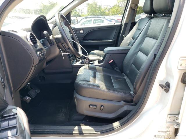 Photo 7 from auction – 2009 FORD TAURUS X L with VIN 1FMDK06W69GA00527