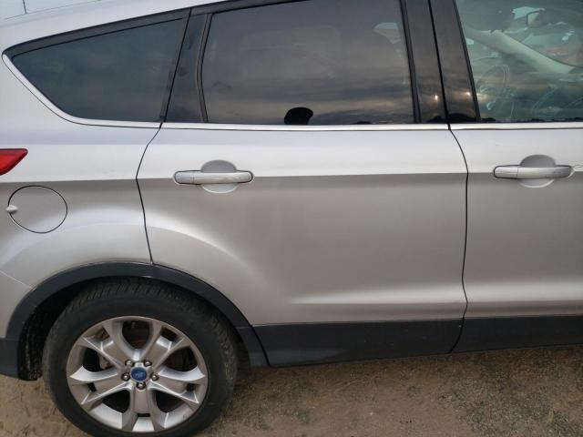 Photo 10 from auction – 2013 FORD ESCAPE SEL with VIN 1FMCU9H91DUD70943