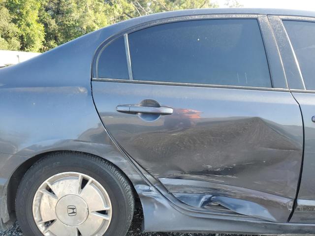 Photo 10 from auction – 2007 HONDA CIVIC HYBR with VIN JHMFA36287S001525
