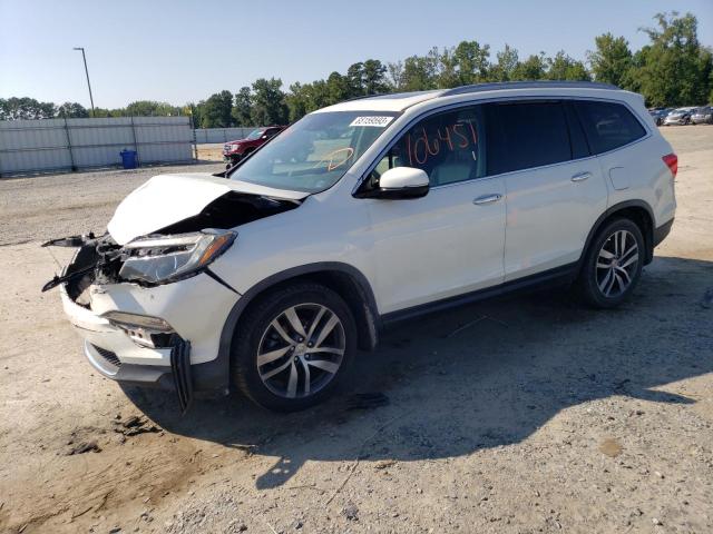 HONDA PILOT TOUR 2017 with VIN 5FNYF6H92HB049737 - Photo from auction