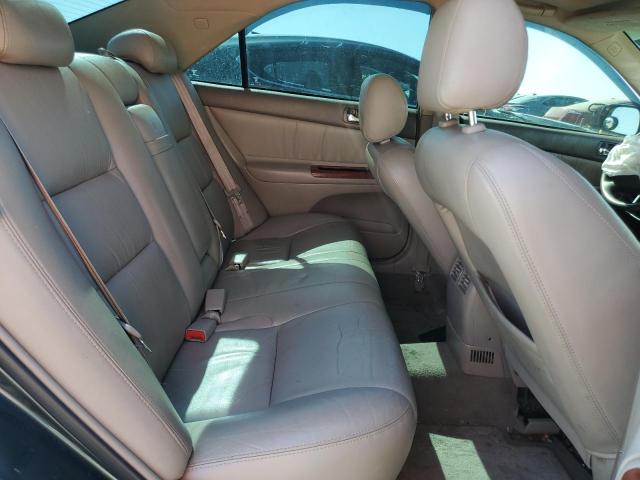 Photo 10 from auction – 2002 TOYOTA CAMRY LE with VIN 4T1BF30K42U521658