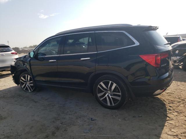 Photo 2 from auction – 2018 HONDA PILOT TOUR with VIN 5FNYF5H93JB003057