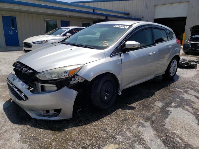 FORD FOCUS SE 2015 with VIN 1FADP3KE2FL285403 - Photo from auction