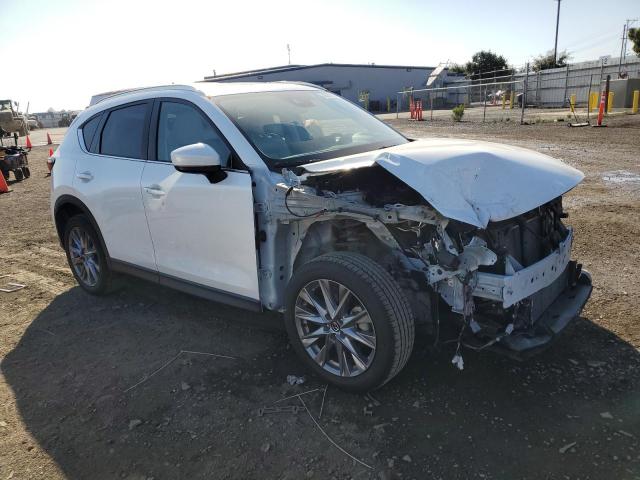 Photo 4 from auction – 2021 MAZDA CX-5 GRAND with VIN JM3KFBAY1M0348703