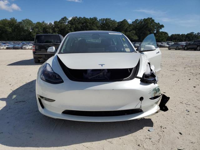 Photo 5 from auction – 2023 TESLA MODEL 3 with VIN 5YJ3E1EA4PF583089