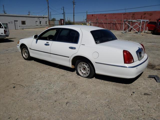 Photo 2 from auction – 2000 LINCOLN TOWN CAR E with VIN 1LNHM81W1YY858126