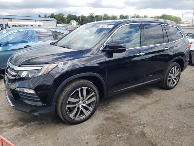 HONDA PILOT TOUR 2016 with VIN 5FNYF6H93GB052645 - Photo from auction