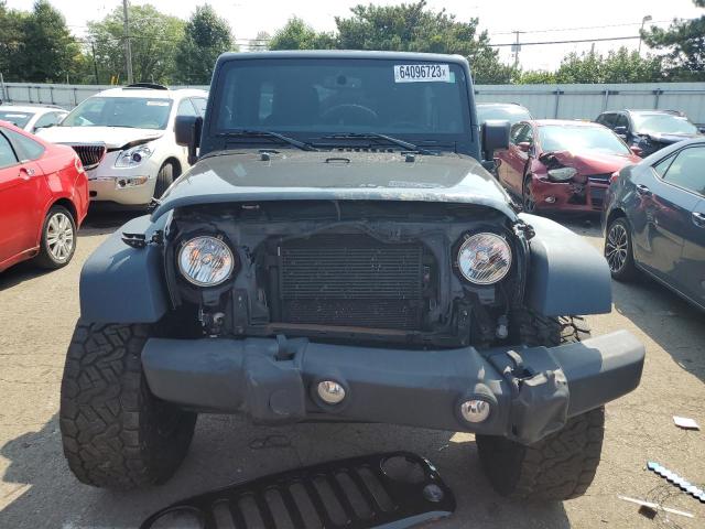 Photo 5 from auction – 2014 JEEP WRANGLER U with VIN 1C4BJWDG7EL116608